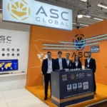 ASC Global team at Embedded World 2023 booth, engaging with visitors and showcasing innovative electronic solutions during their second successful year at the event