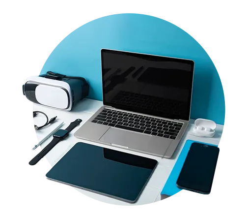 Assorted consumer electronics including smartphones, tablets, and smartwatches displayed together, representing ASC Global's services for the consumer electronics industry and support for sourcing essential electronic components.