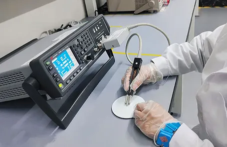 global_sourcing_validation ASC Global engineer performing product validation on an electronic component using bench testing equipment to verify authenticity, functionality, quality, and compliance with performance and regulatory standards.