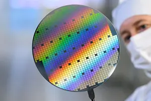 Visual representing Bosch unveiling next-generation silicon carbide (SiC) chips designed to improve electric vehicle efficiency, power performance, and driving range