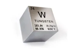 Illustration of tungsten ore, industrial metals processing, and manufacturing equipment within a global supply chain environment. The image represents record-high tungsten prices driven by China's export controls, reduced mining output, and growing industrial demand. Visual elements highlight the metal's importance to aerospace, defense, electronics, machinery manufacturing, and the supply chain challenges affecting critical industrial materials worldwide.