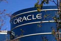 Illustration of a modern cloud data center powered by artificial intelligence, featuring high-performance servers, advanced networking infrastructure, and digital analytics dashboards. The image represents Oracle's stronger-than-expected financial results driven by surging AI cloud demand, highlighting enterprise cloud computing, scalable AI infrastructure, data processing capabilities, and continued investment in next-generation cloud technologies supporting businesses worldwide.