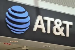 Illustration of a nationwide telecommunications network featuring fiber-optic infrastructure, 5G towers, satellite connectivity, and digital data streams linking homes, businesses, and industrial facilities. The image represents AT&T's planned $250 billion investment in U.S. connectivity, highlighting broadband expansion, next-generation wireless networks, cloud computing growth, AI-driven data demand, and the workforce supporting critical communications infrastructure across North America.