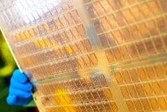 Illustration of advanced power management semiconductors operating within an AI data center environment, featuring high-performance processors, chiplets, voltage regulation systems, and server infrastructure. The image represents Analog Devices' acquisition of Empower Semiconductor, highlighting integrated voltage regulator technology, AI accelerator power delivery, chiplet-level power management, energy efficiency, and the growing demand for advanced semiconductor solutions supporting next-generation computing platforms.